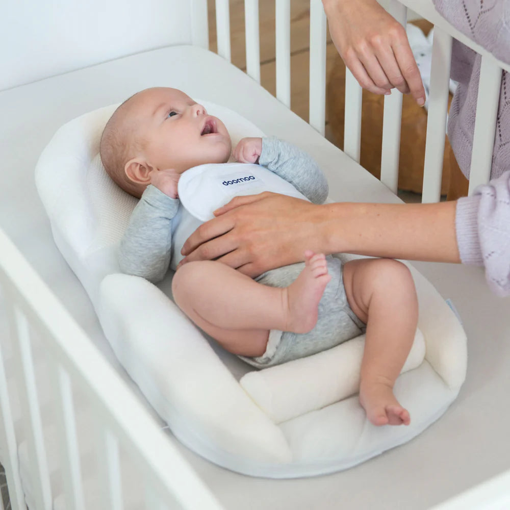 Doomoo supreme sleep plus redutor para bebé